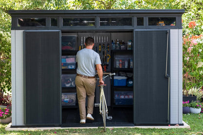 Keter Artisan 11x7 Modern Resin Outdoor Storage Shed Kit-Perfect to Store Patio Furniture, Garden Tools Bike Accessories, Beach Chairs and Lawn Mower, Grey & Black